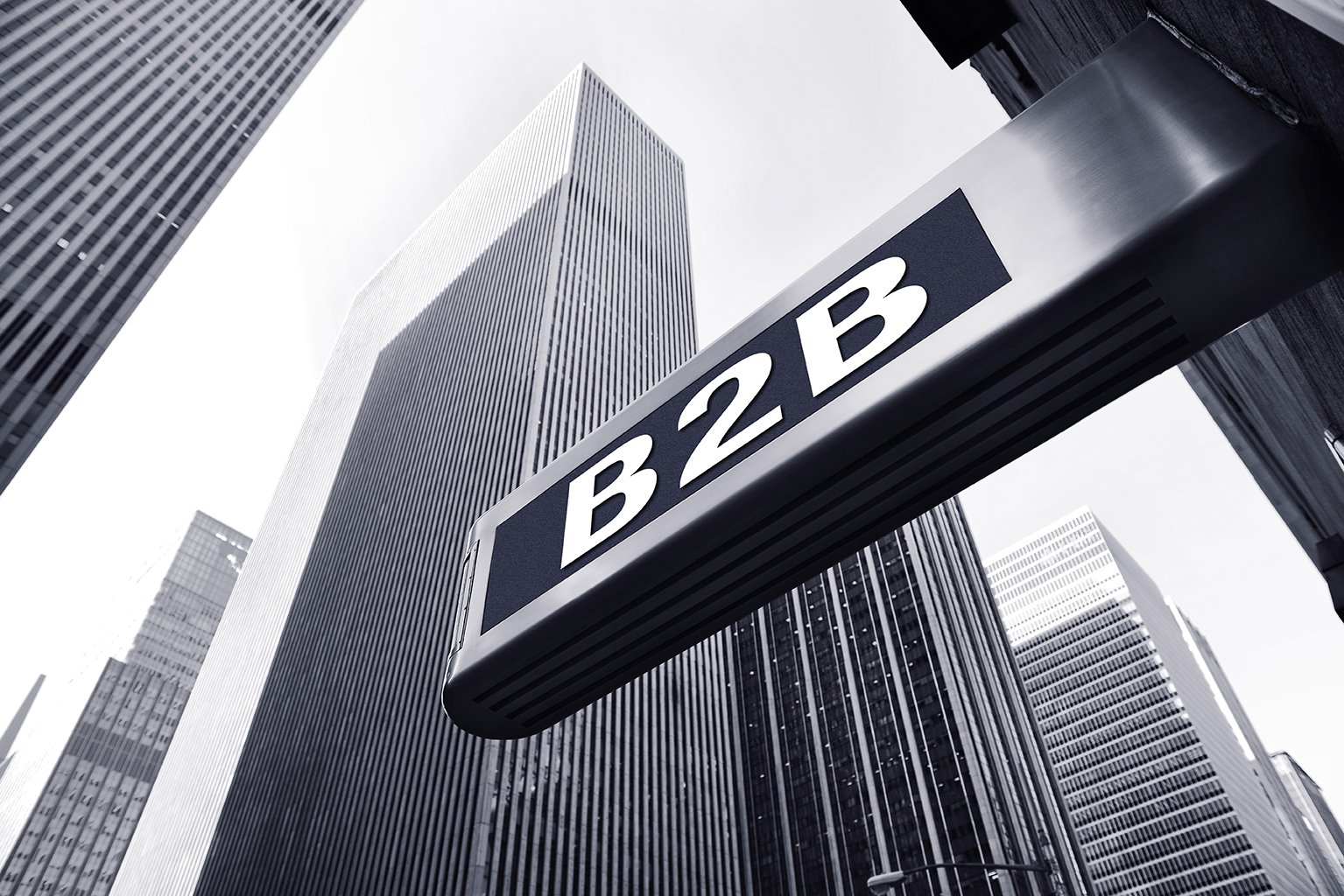 stock-photo-b-b-symbol-against-office-buildings-507473278